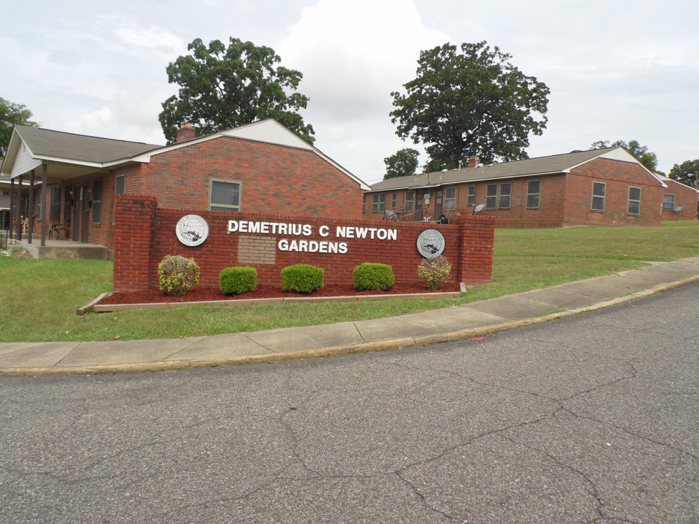 Demetrius Newton Gardens entrance sign.