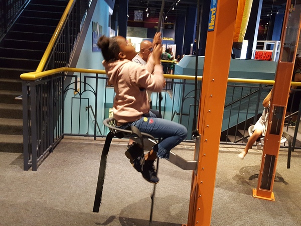 girl on climbing machine